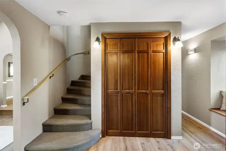 Let's go upstairs! Notice the architectural details of the curved staircase.