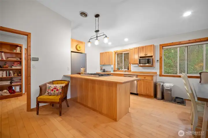 Notice the vaulted ceilings in the main part of the home--it adds to the light and spaciousness of the 'great room'.