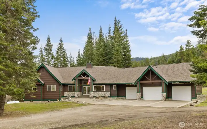 Perfect sized Rambler on 5+ acres in the heart of recreation! The 3 car attached heated garage is fully finished with electric doors & extra fridge + fridge/freezer.