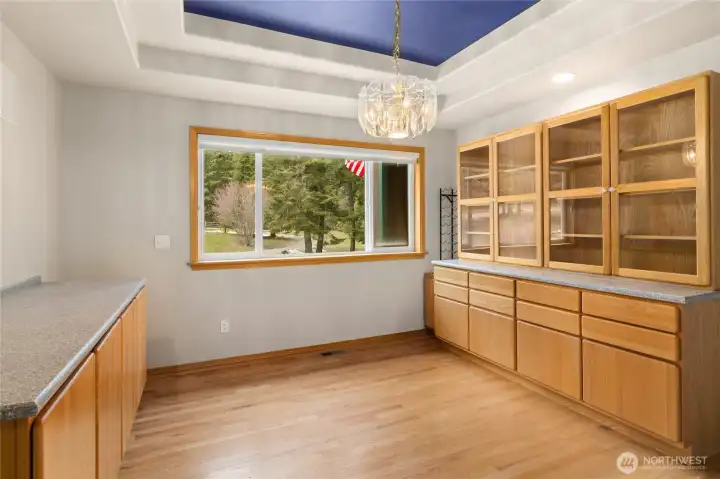 Dining Room with coffered ceilings! Gorgeous built in china cabinet with hutch, and serving buffet.