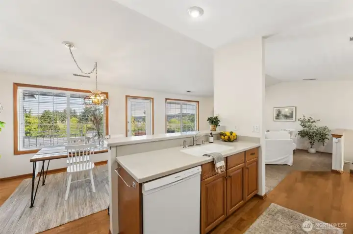 The main floor features open views from the living room, dining room and kitchen.