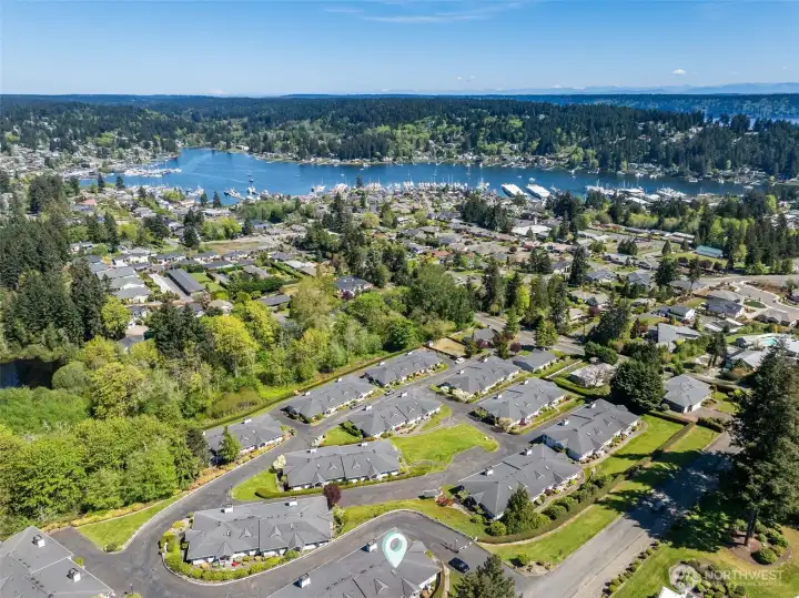 Bird's eye view looking northeast over Gig Harbor Bay, with the condo at the bottom of photo.