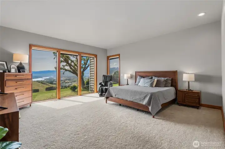 Luxious Primary Suite with Huge Windows to Take in The View