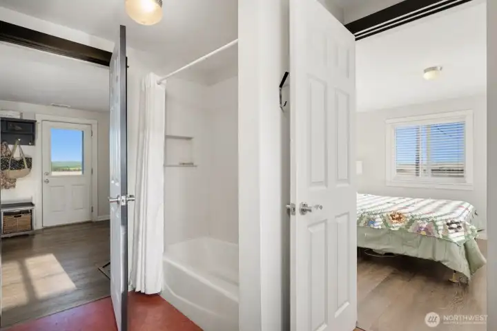 Primary bedroom attached to main bath