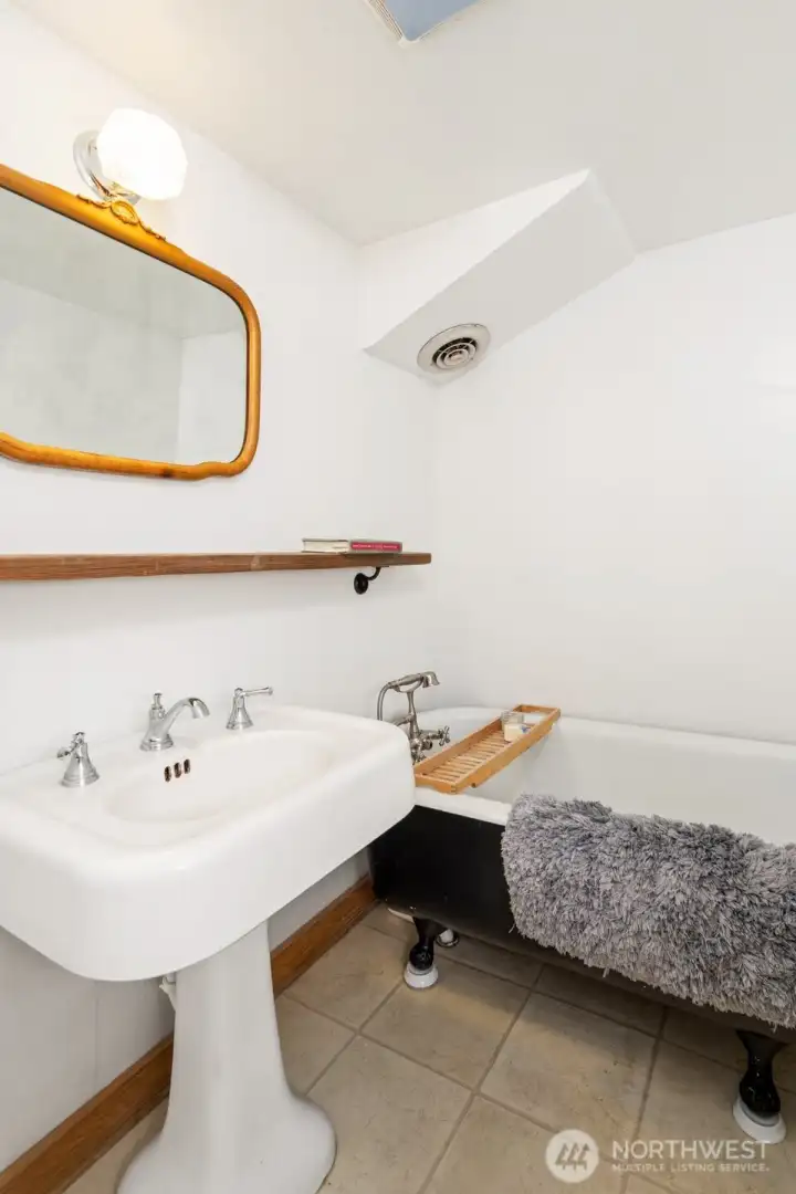 Basement bath with clawfoot tub