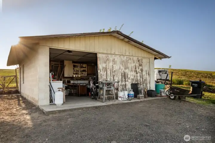 Garage with room for 2 cars and storage/workbench