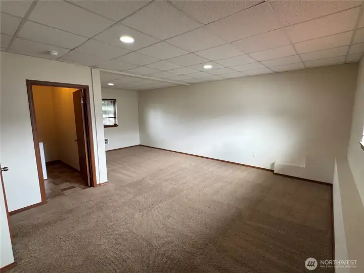 Spacious downstairs bonus room and laundry room