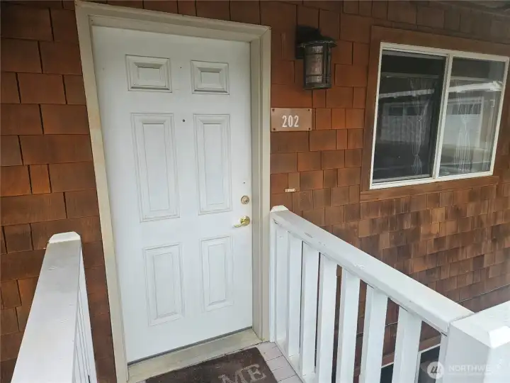 Welcome Home!  The entry is level for easy access from the parking lot.