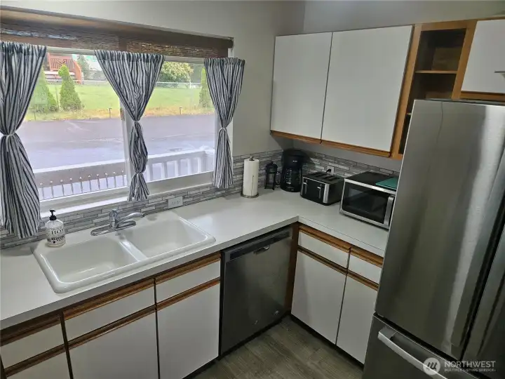 All the counter-top appliances stay.