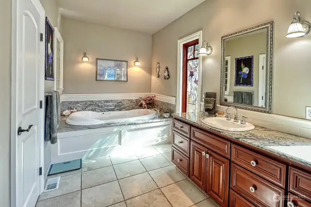 The Primary has TWO bathrooms. Enjoy a nice and deep soaking tub or shower.