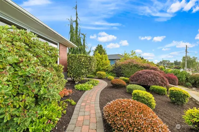 Lush landscaping with sprinkler system