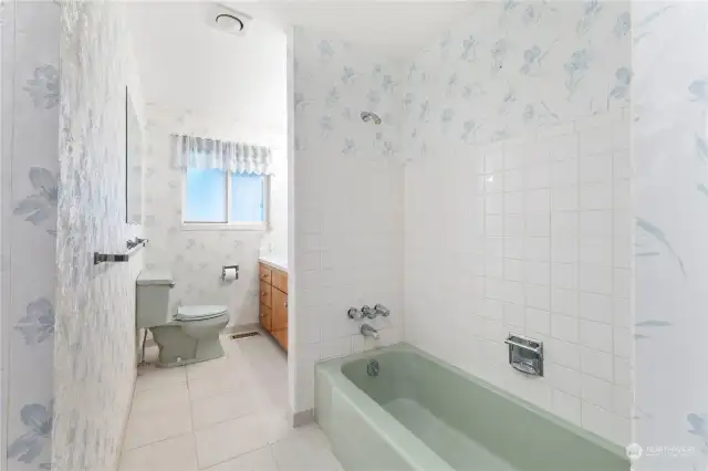 Main full Bath has tile floors.