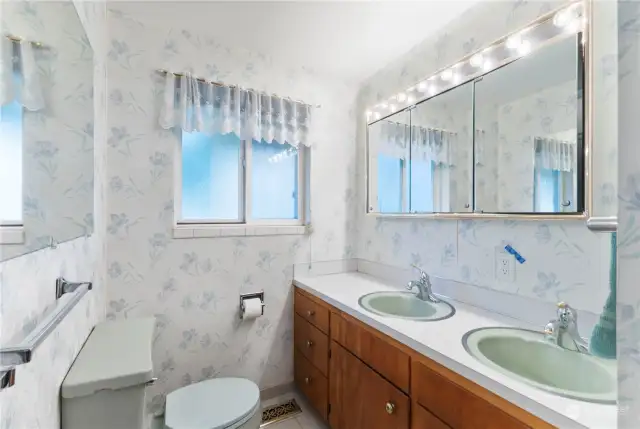 Vintage, fun Main Bath with double sink Vanity.