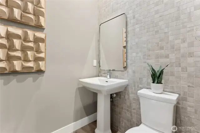 Main floor Half bath. Photos are for representational purposes only.  Colors and options may vary.
