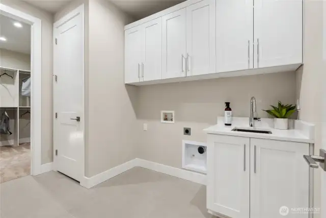 Upstairs Laundry includes Sink & Cabinets. Photos are for representational purposes only.  Colors and options may vary.