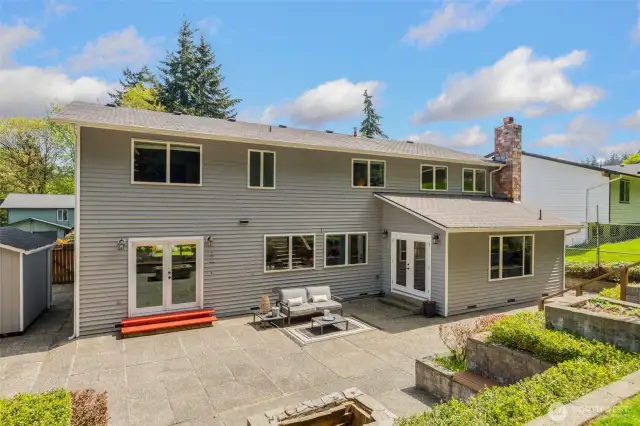 Fenced backyard offers plenty of garden space