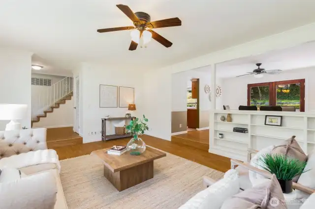View from living room showcasing the main level circular floorplan, perfect for entertaining.