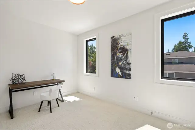 This bedroom shows as an office. Great light!