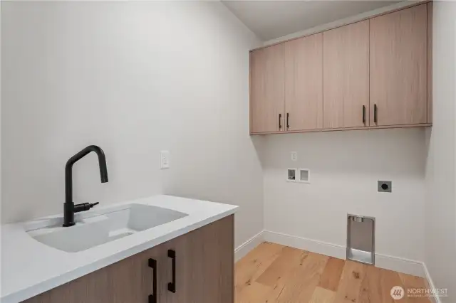 Handy utility sink in upstairs laundry