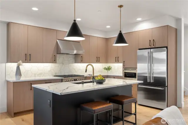 Belmont cabinets with recycle center and pull outs