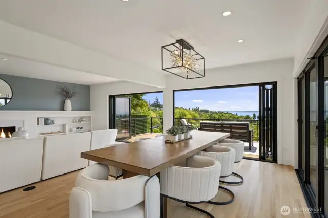 Large dining area that opens to the deck space with Nana walls for true indoor outdoor living.