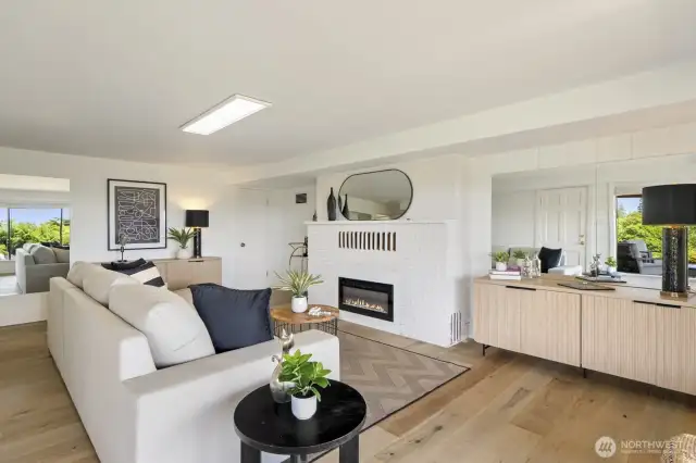 Lower level family room with new fireplace and lots of natural light and full views.