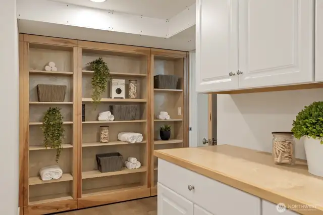 Built in storage in the laundry room.