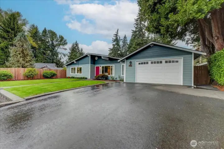 Extra large driveway, plus a oversize 2 car tandem garage with garage access straight through to the back yard.  Lots of possibilities with this oversize garage! Home has hardiplank siding.
