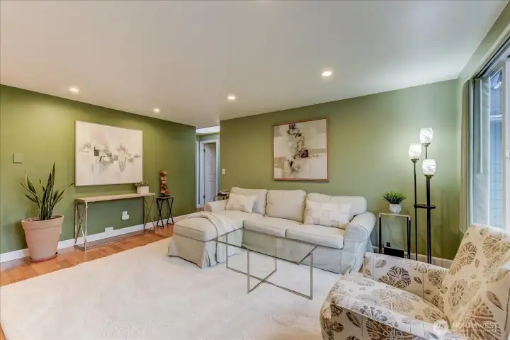 Welcome home to your primary living area that flows like a Great room with the dining and kitchen off to the left
