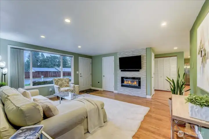 Relax with your Electric Fireplace... the living space has a great room feel...showered with plenty of natural light through out.
