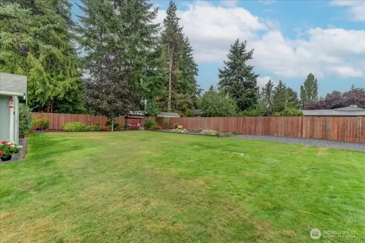 Fully Fenced Large back yard with garden area...you see pumpkins right now...zoom in