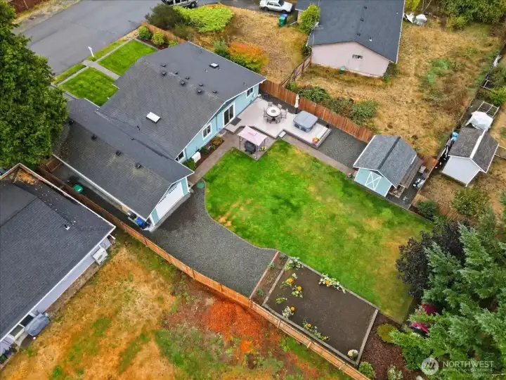Fabulous back yard, 10'x14' Shed for storage or create an office or a getaway(Has electrical) zoom in and take a look at your garden...relax and entertain, or sit quietly and re-charge. look at those pumpkins!