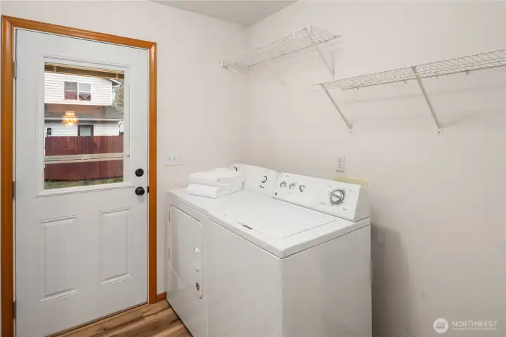 Back entry and laundry room off Kitchen.