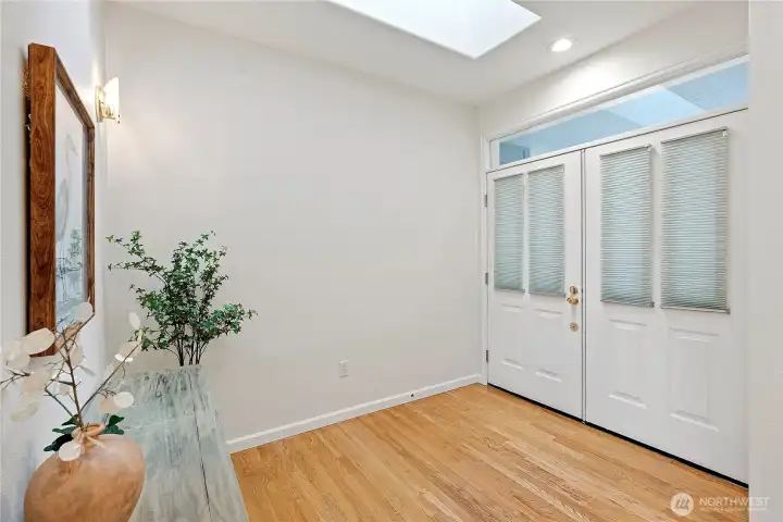 Gracious foyer with skylight