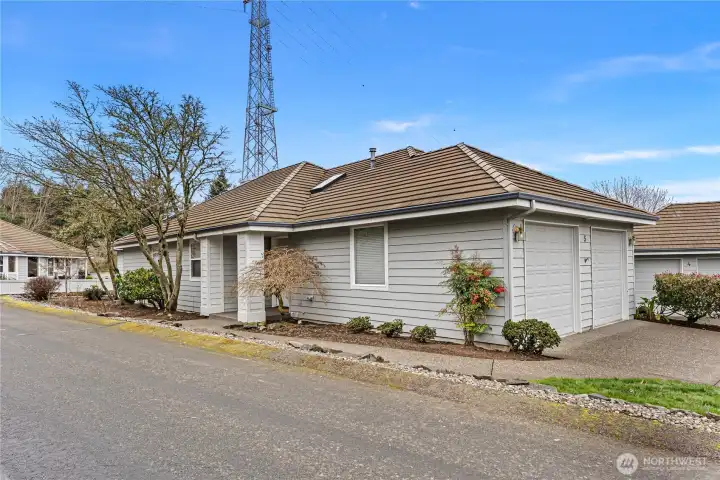 The two-car garage features built-in cabinets