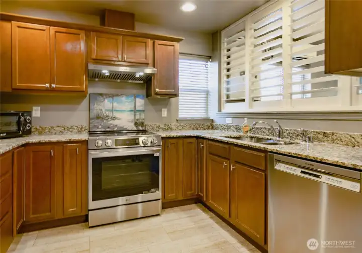Beautiful granite counters and lots of light from the kitchen window.