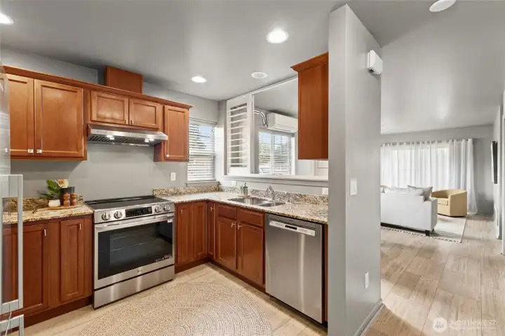 The window brings in lots of light to the kitchen. The window brings in lots of light to the kitchen.