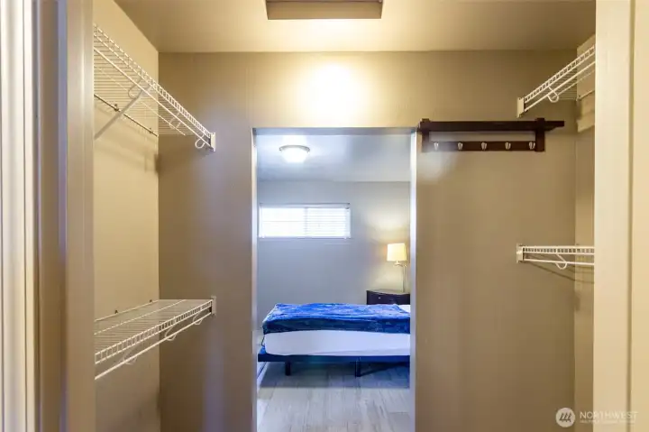 The large walk-in closet is right off the bedroom.
