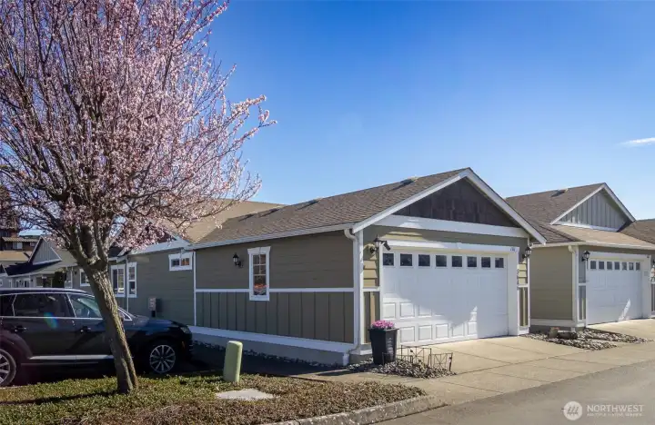 On the side of the unit is an area for guest parking.  Just a short walk around the unit to the front door.