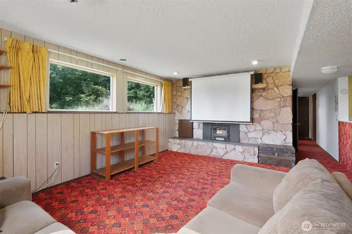 Sellers have enjoyed their basement in its classic style - note the added wood burning insert to make it extra cozy! This level offers family room, 2nd kitchen w/dining space, 3/4 bath and an additional finished sewing/craft/storage room and could potentially become a great M-I-L space.