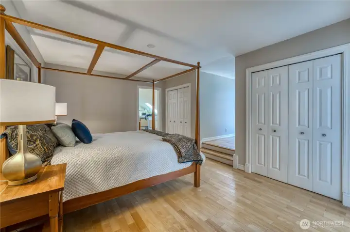 Upstairs level 2 primary ensuite with full bath and access to  den/office/flex room and outdoor deck.