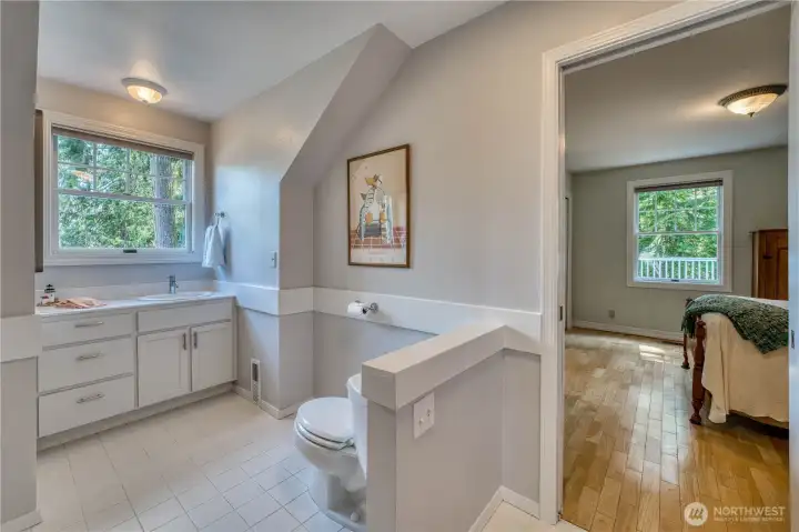 Upstairs level 2 Jack and Jill full bath connects to both bedrooms.