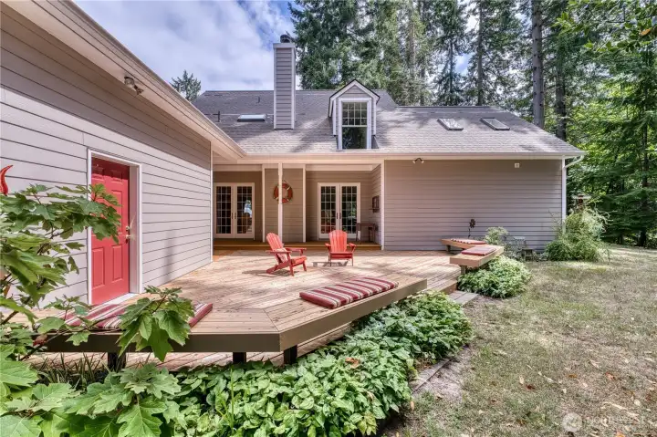 Large West facing outdoor entertainment deck with garage access.  Privacy galore and no neighbors!