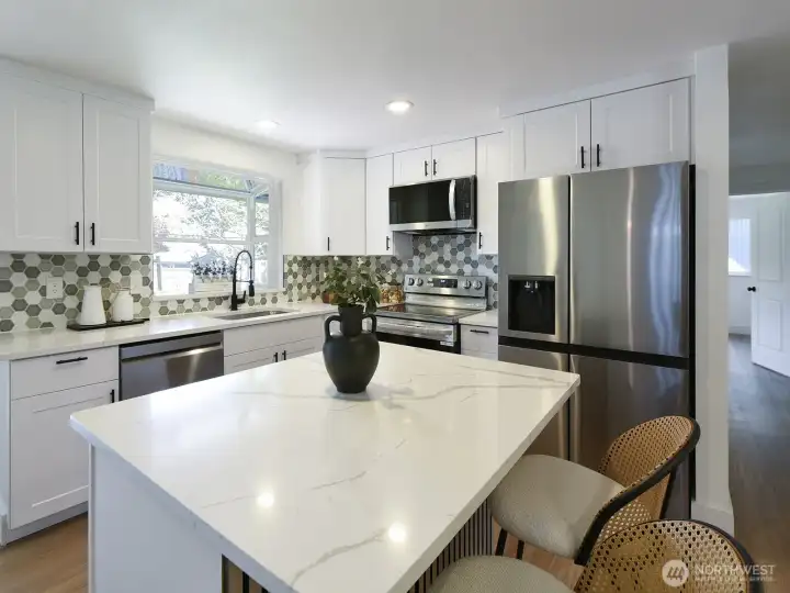 All new appliances are ready for your culinary adventures. The spacious countertops offered ample room for meal preparations, while the open layout invites gatherings and cheerful conversation.
