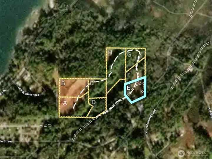 Overhead view of the entire development with approximate boundaries in Yellow and the subject property in Blue.