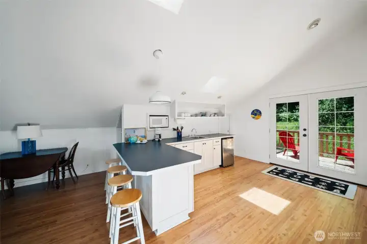 Everything you need is here. Open plan with eat-in kitchen, plus dining area, living room with a view, two bedrooms and bath.