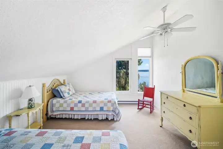 Bedroom with a view to the water, vaulted ceiling and plenty of closet space