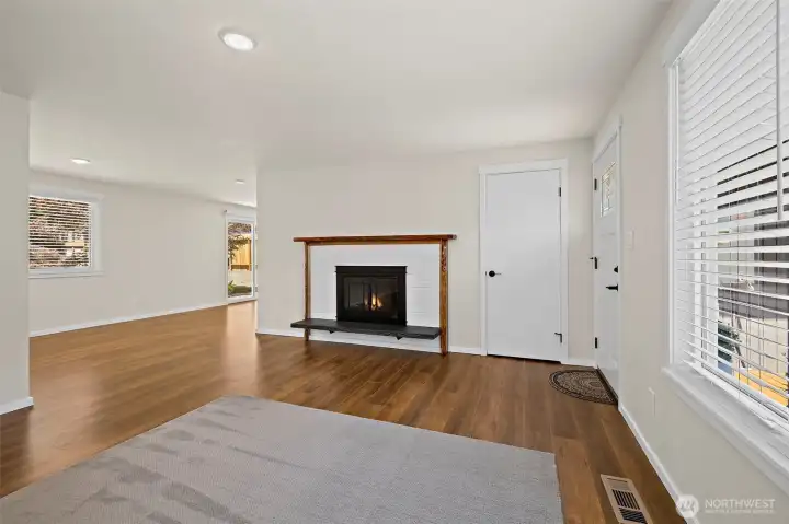 Living room opens up towards the dining space and family room.