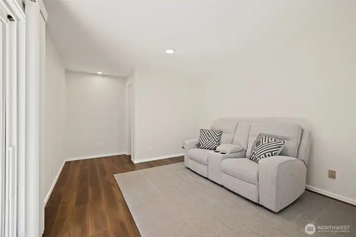 Another view of the family room where you can see the entry to the pantry/storage.