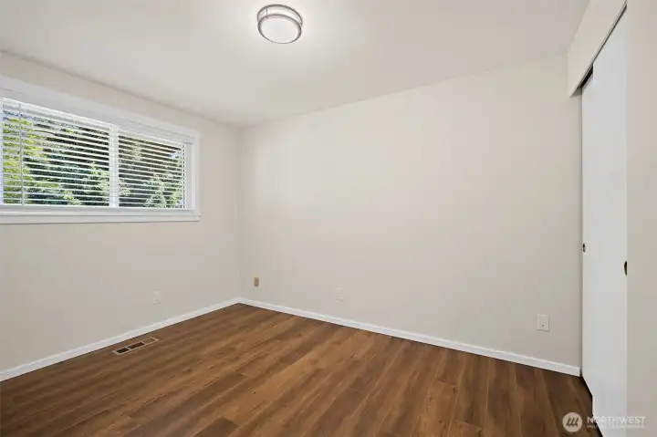 This bedroom faces the front of the home.
